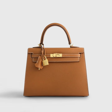 Hermès Kelly 25 Sellier in Gold Epsom leather with gold-tone hardware.