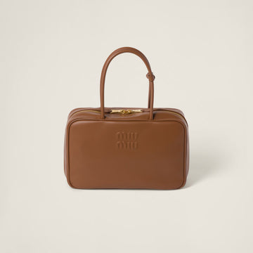 Miu Miu Beau collection, paired with a matching micro-bag charm