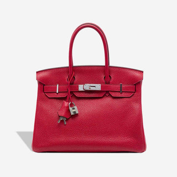 Red Hermès Birkin handbag crafted from grained leather with palladium (silver-tone) hardware