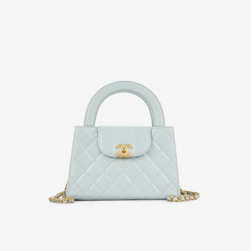Chanel Nano Kelly Shopper bag in light or baby blue quilted calfskin with gold-tone hardware