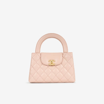 Chanel Shiny Aged Calfskin Quilted Nano Kelly Shopper in light pink with brushed gold-tone hardware