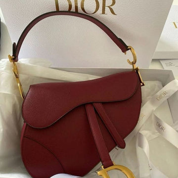 Christian Dior Saddle Bag with Strap in a red grained calfskin