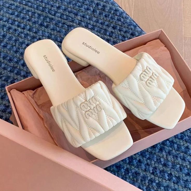 Miu Miu Matelassé Nappa Leather Slides.