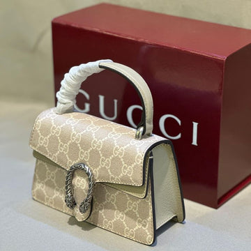 Gucci Dionysus Mini Top Handle Bag in GG Supreme canvas with light leather trim and silver-toned tiger-head hardware