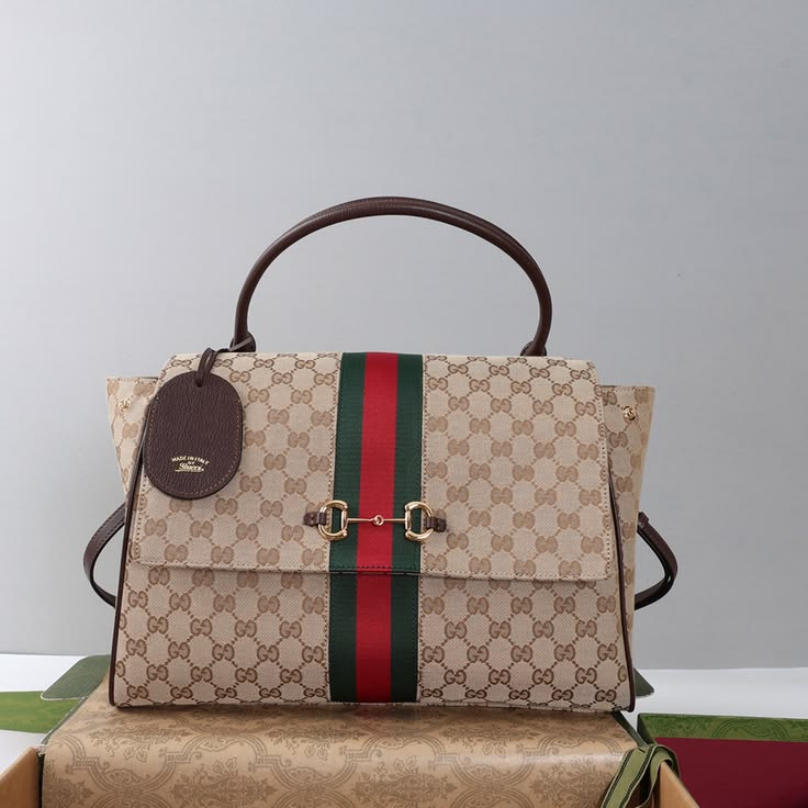 Gucci Paparazzo Medium Top Handle Bag in sand and brown GG canvas