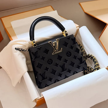 black Louis Vuitton Capucines handbag