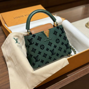 green Louis Vuitton Capucines handbag