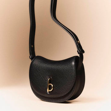 Burberry Rocking Horse Bag in black pebbled calf leather.