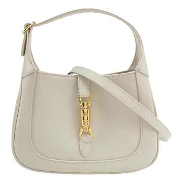 Gucci Jackie 1961 Small Shoulder Bag featuring the line's signature gold-tone piston lock closure