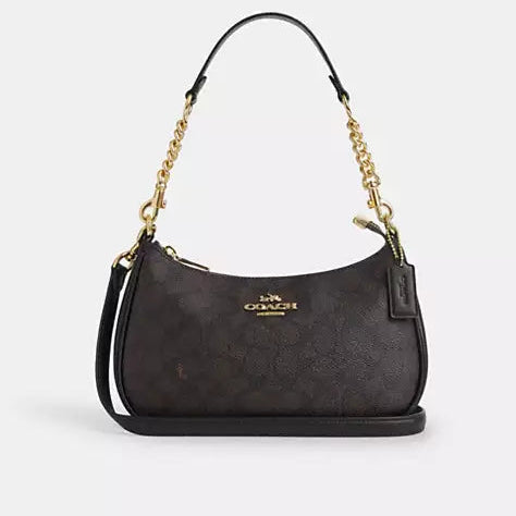 Coach Teri Shoulder Bag in Signature Canvas paired with a matching small card case or wallet