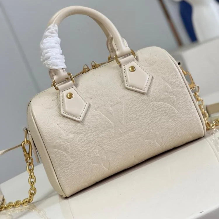 Louis Vuitton Speedy Bandoulière 20 in cream-color