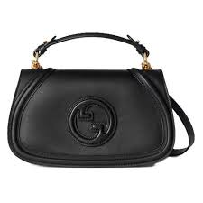 Gucci Blondie Small Top Handle Bag featuring the debossed round Interlocking G logo